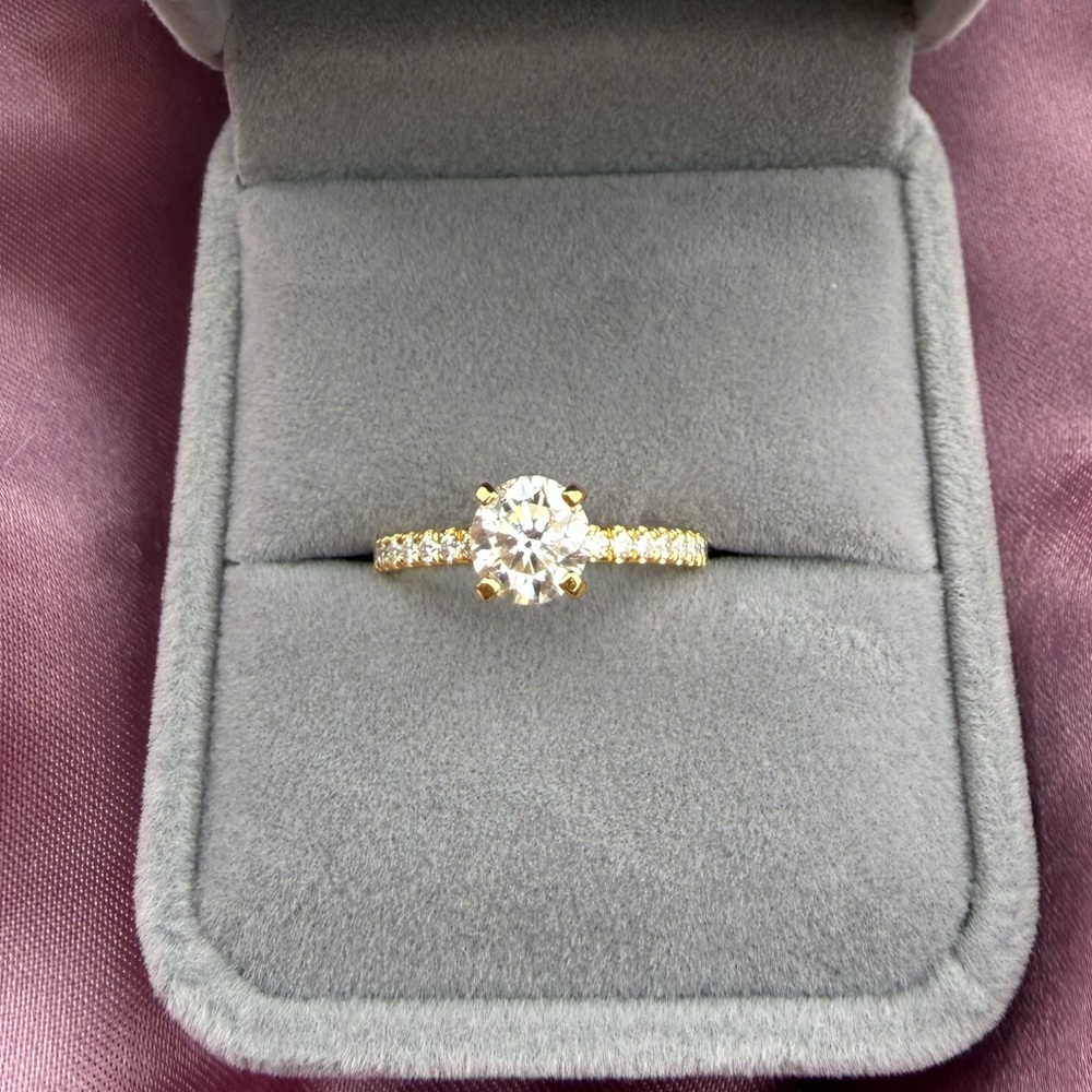 Gold Solitaire Round-Cut Engagement Ring with Pavé Band